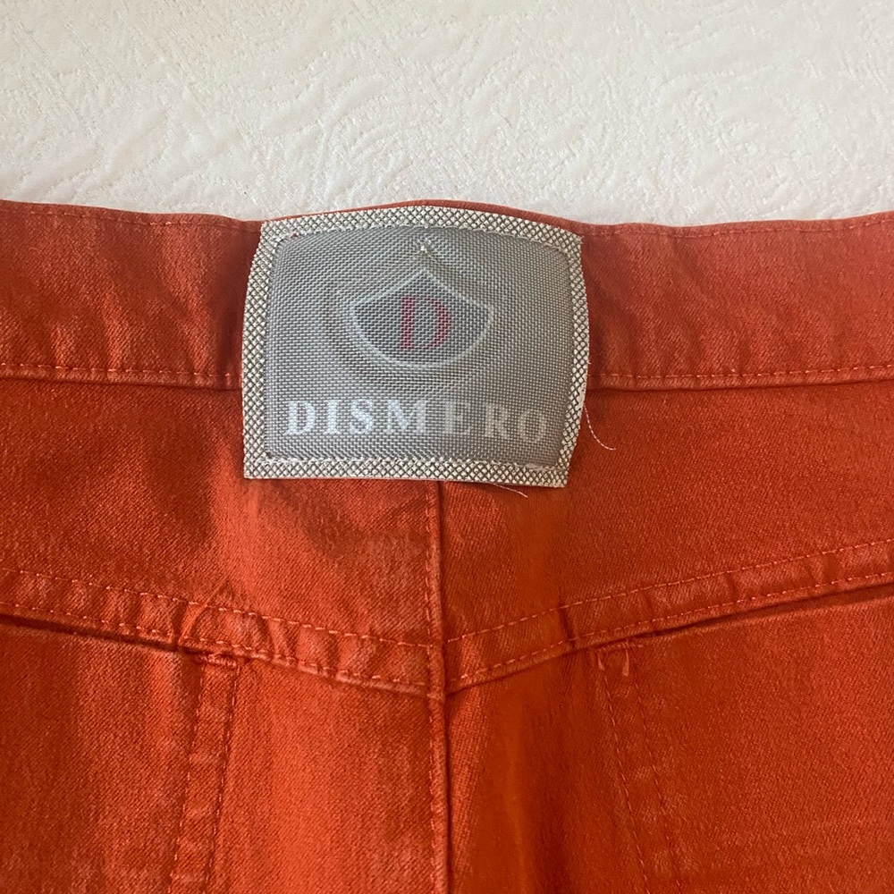 Dismero Jeans; orange. Haven’t been worn in years!